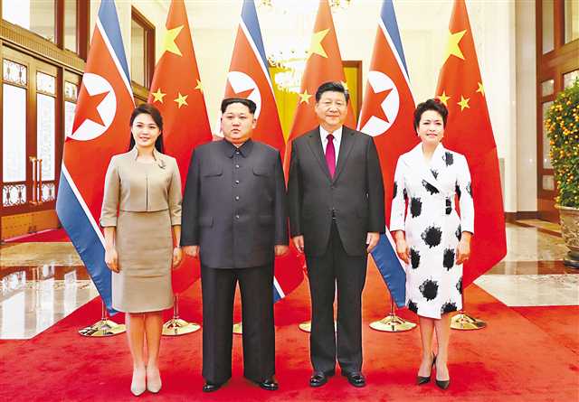 习近平同金正恩举行会谈